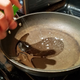 egg spraying into pan